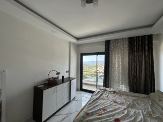 GÜLLÜK'TE MODERN DENİZ MANZARALI BAHÇELİ SATILIK LÜKS DUBLEKS!