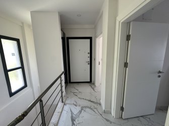 GÜLLÜK'TE MODERN DENİZ MANZARALI BAHÇELİ SATILIK LÜKS DUBLEKS!