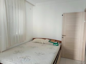 GÜLLÜK'TE BALKONLU 1+1 SATILIK DAİRE