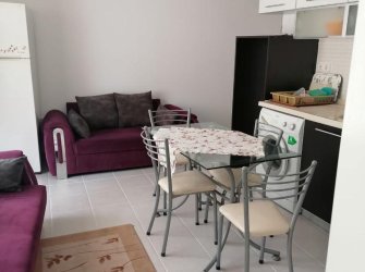 GÜLLÜK MERKEZDE DENİZE YÜRÜME MESAFESİNDE SATILIK 1+1 DAİRE