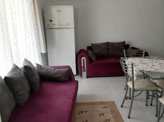 GÜLLÜK MERKEZDE DENİZE YÜRÜME MESAFESİNDE SATILIK 1+1 DAİRE