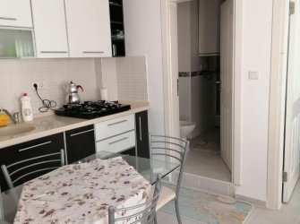 GÜLLÜK MERKEZDE DENİZE YÜRÜME MESAFESİNDE SATILIK 1+1 DAİRE