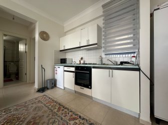 GÜLLÜK'TE HAVUZLU SİTE İÇERİSİNDE DENİZ MANZARALI 2+1 DAİRE