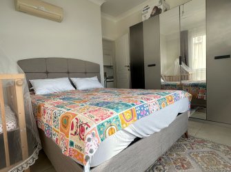 GÜLLÜK'TE HAVUZLU SİTE İÇERİSİNDE DENİZ MANZARALI 2+1 DAİRE