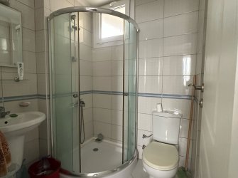 GÜLLÜK'TE HAVUZLU SİTE İÇERİSİNDE DENİZ MANZARALI 2+1 DAİRE