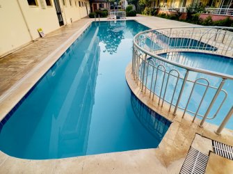 GÜLLÜK MERKEZDE DENİZE YÜRÜME MESAFESİNDE SATILIK 1+1 DAİRE